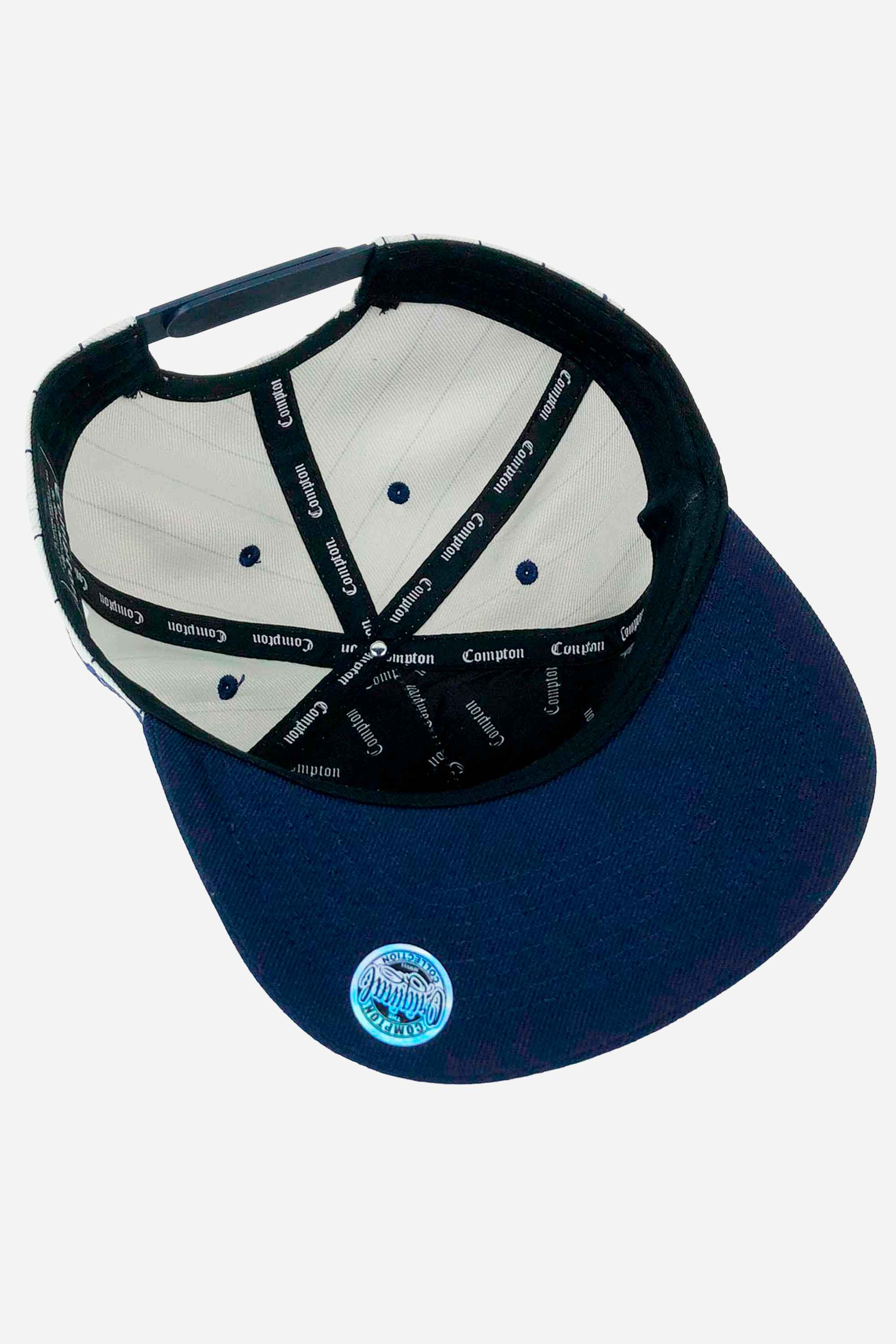 Boné Compton Aba Reta Snapback Classic Pinstripe Azul de cima, interior com costura detalhada e logo visível.
