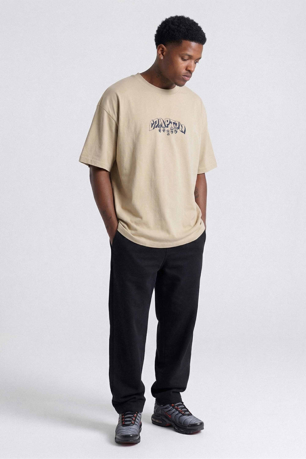 Camiseta Compton Oversized NWA Faces Alto Relevo Caqui